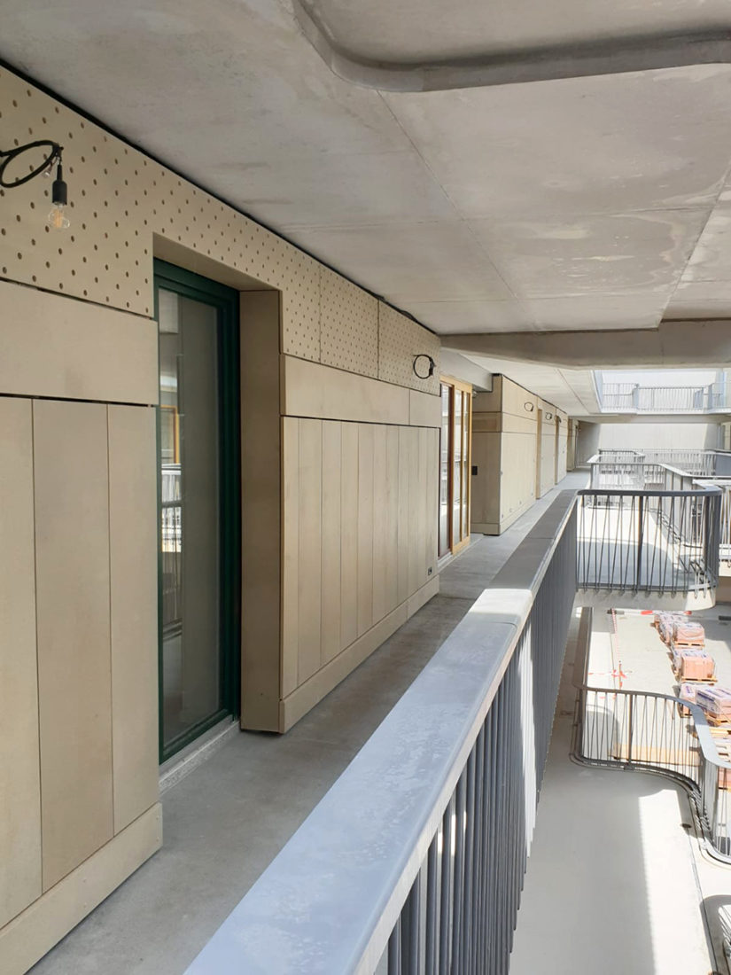 erlenmatt-ost-c-basel-huerzeler-holzbau-innenhof-ausbau-wand-nachhaltig
